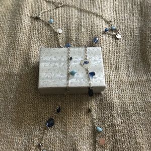 Silver toned with blue beads